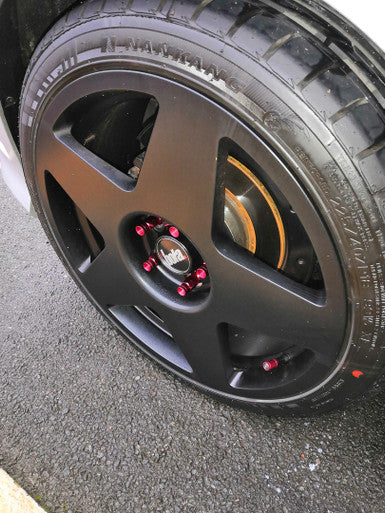 20 x Exoracing Wheel Nuts Forged Steel in purple fitted to black bola alloys
