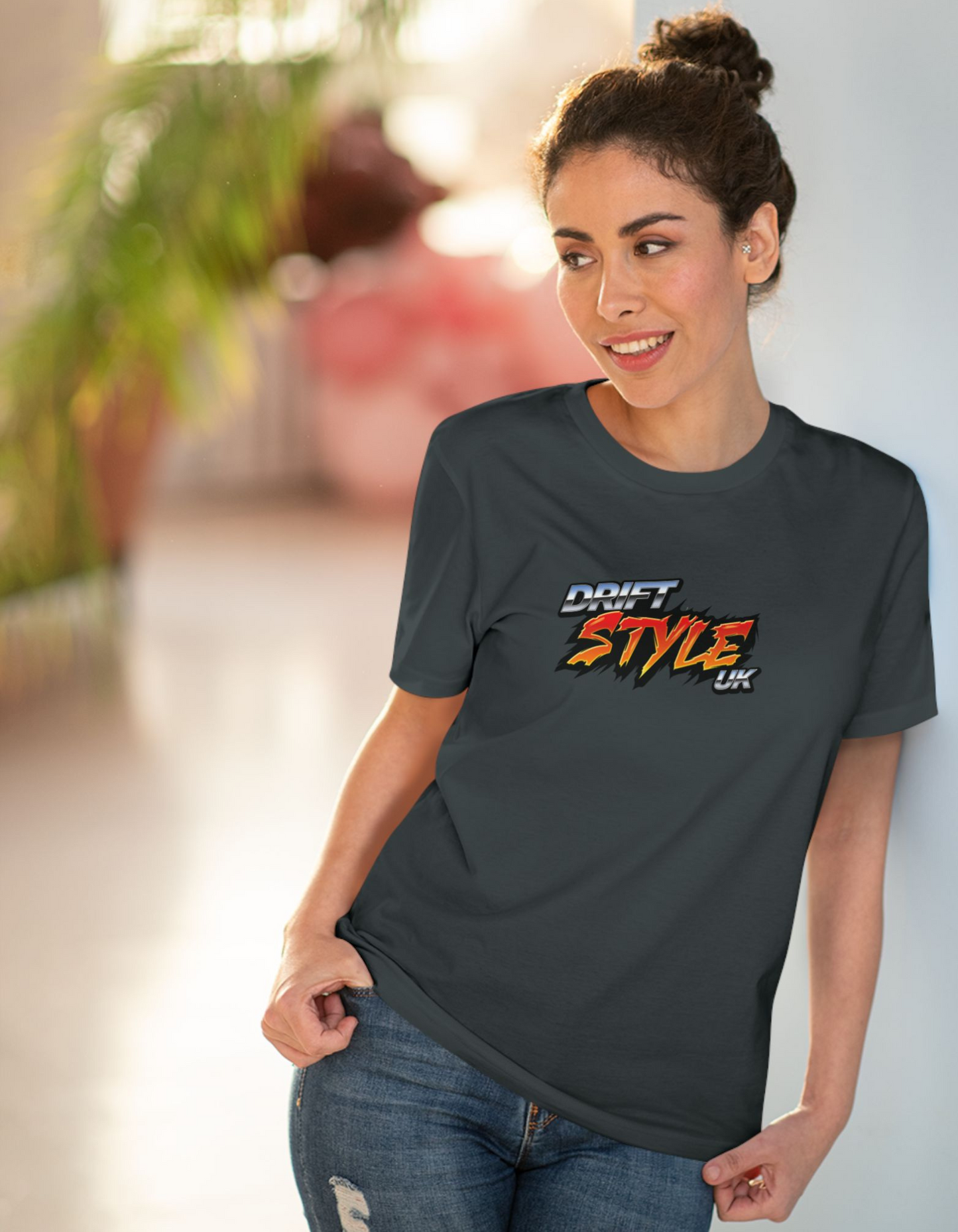 A women wearing a grey tshirt with 'drift style uk' logo