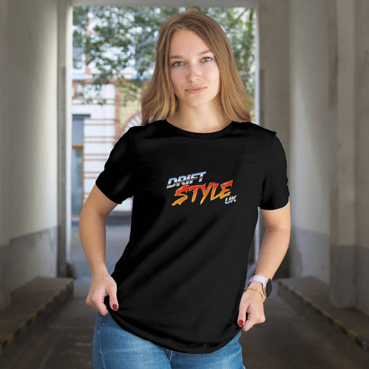 Person wearing a black t-shirt with 'DRIFT STYLE UK' text in an indoor setting