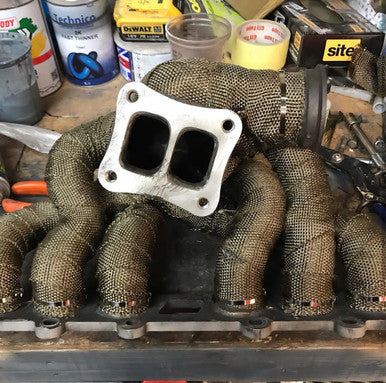 Titanium Exhaust Wrap fitted to an exhaust for maximum heat protection