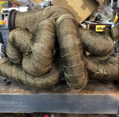 Titanium Exhaust Wrap fitted to an exhaust for maximum heat protection