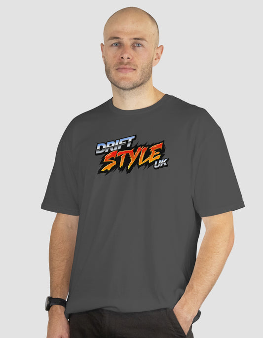 Man wearing a dark gray t-shirt with 'Drift Style UK' logo on a light gray background
