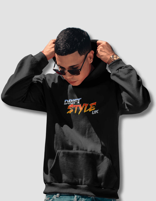 Person wearing a black hoodie with text on a light gray background