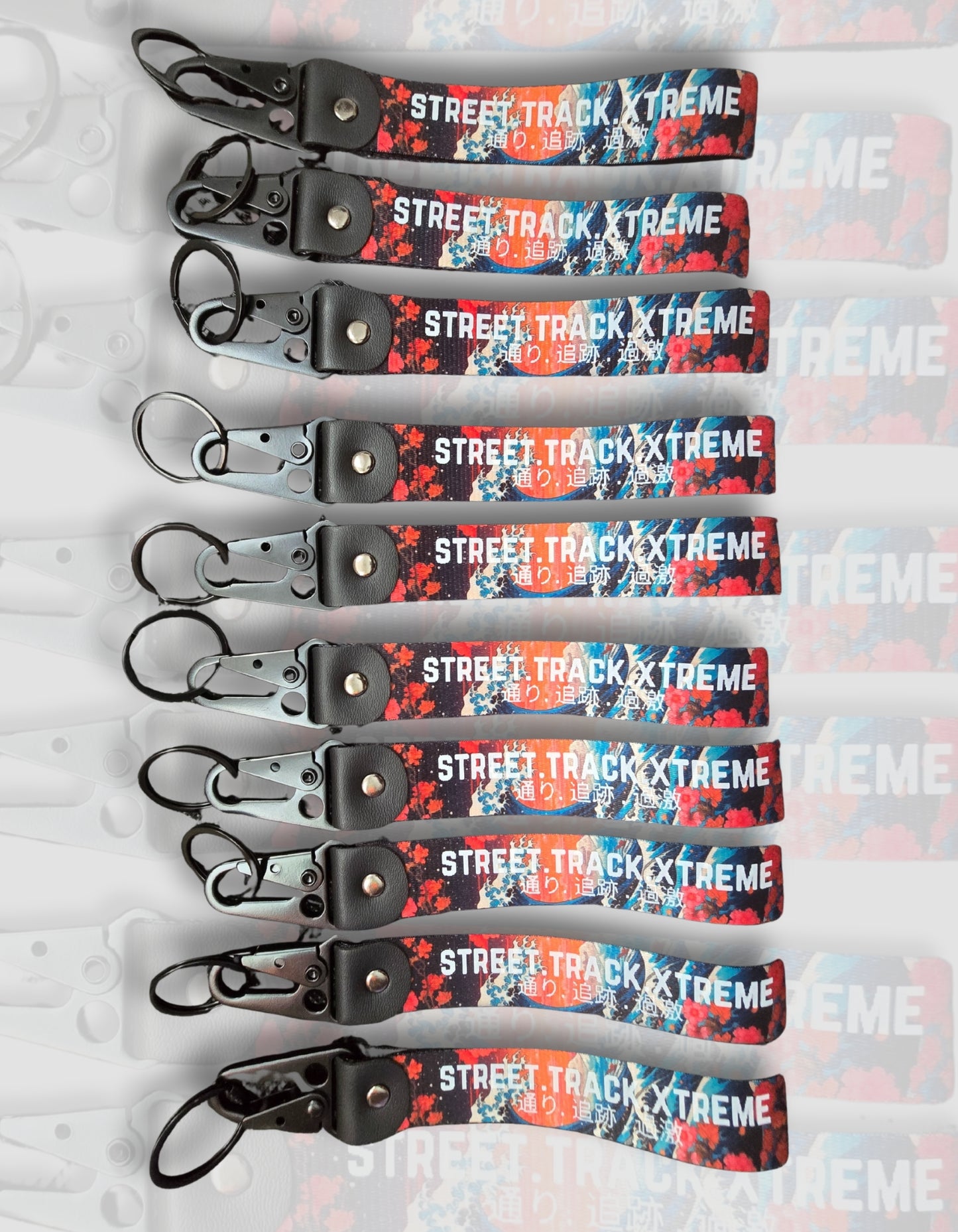 Japanese Waves and Japanese sunset key-ring clip, JDM (Japanese domestic market) style with the words street track extreme printed on it. Japanese automotive style