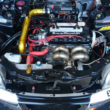 Rolls of gold and silver heat reflective tape, used for reflecting radiant heat in vehicle engine bays