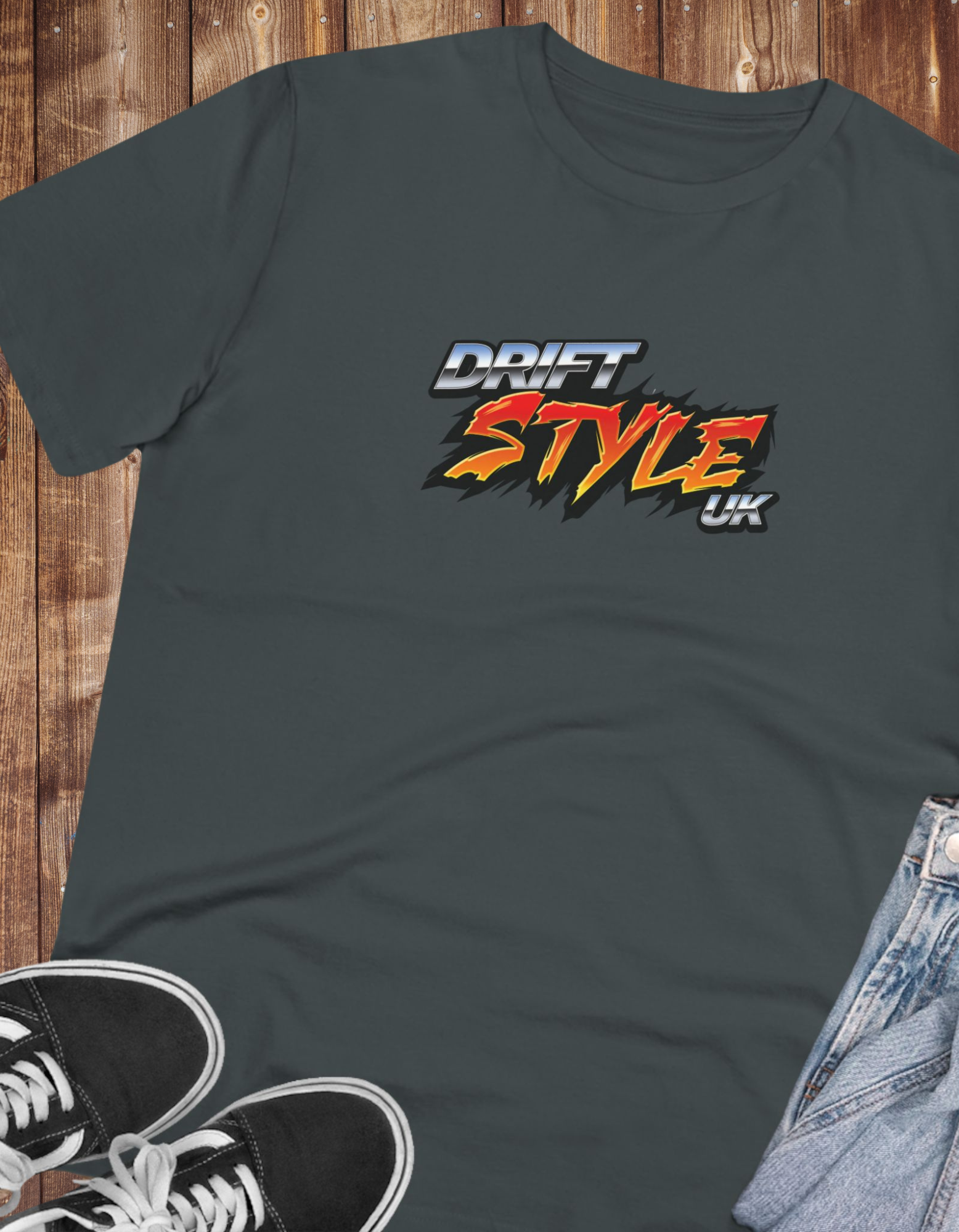 a grey tshirt with 'drift style uk' logo next to a pair of shoes