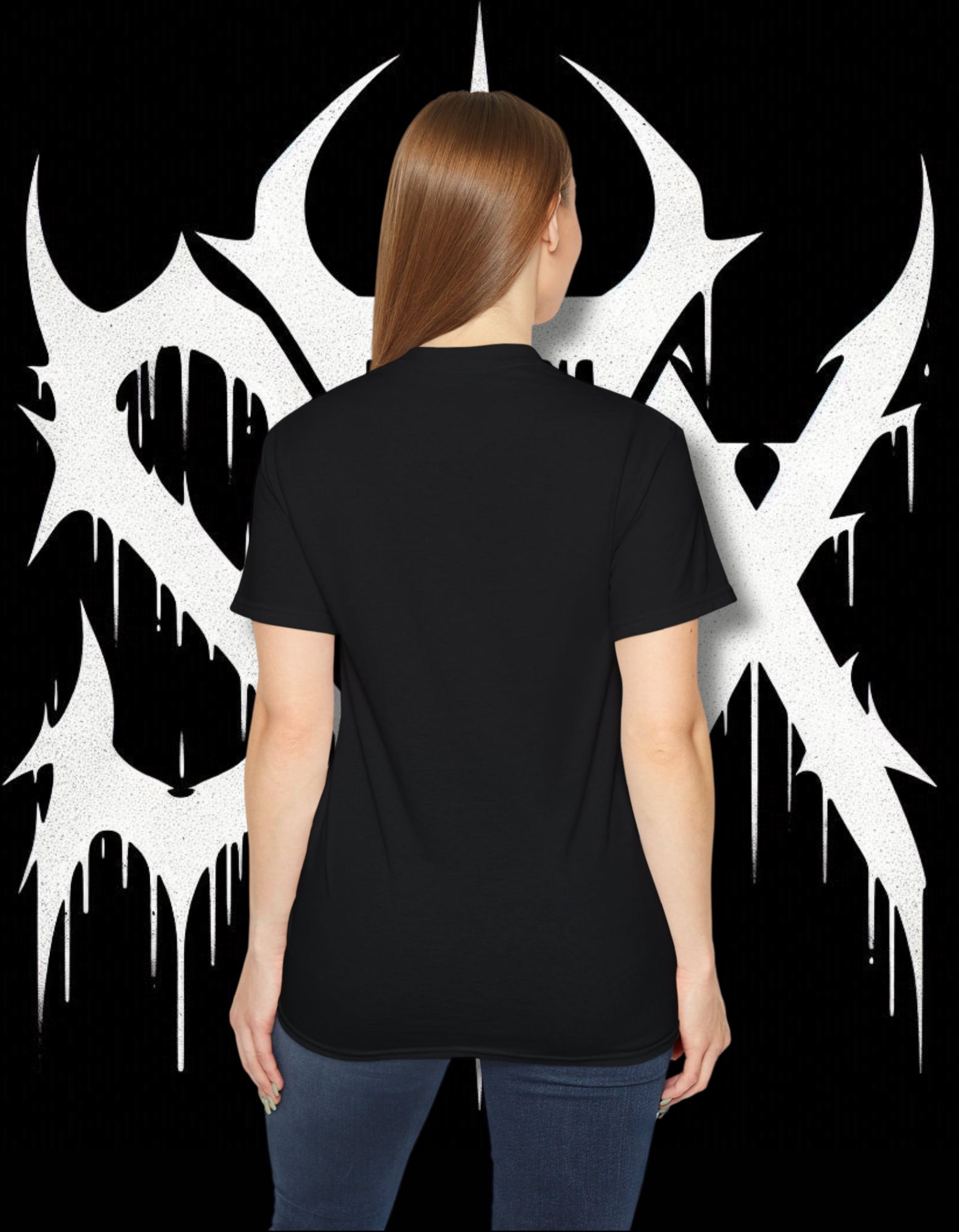 A person wearing a black 'STXSTX' t-shirt with a bold white graphic design resembling a heavy metal style with a slash.