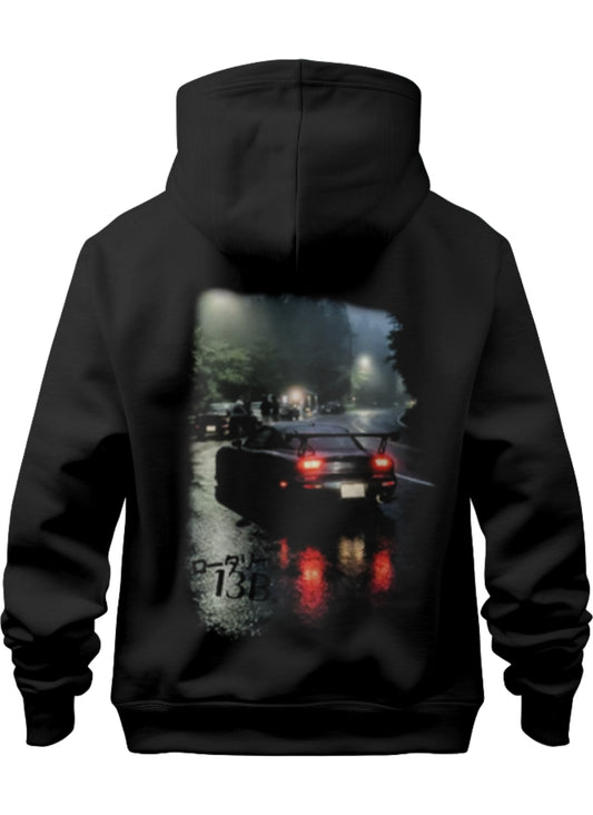 premium black stxstx hoodie with a design of a mazda rx7 13b in the japan mountains late night in wet weather
