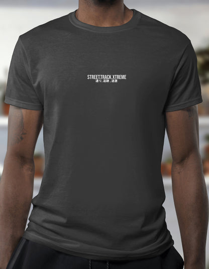 Person wearing a black t-shirt with 'STREETTRACK XTREME' text on a blurred background