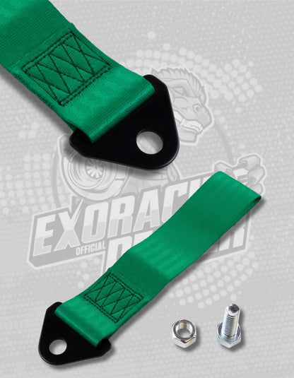 Green strap with black hardware on a gray background with Exoracing logo.