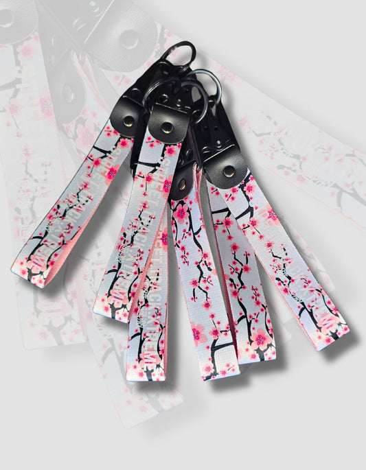 Cherry Blossom key-ring clip, JDM (Japanese domestic market) style with the words street track extreme printed on it. Japanese automotive style